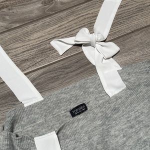 Topshop gray with white shoulder bow tie women us size 6 sweater